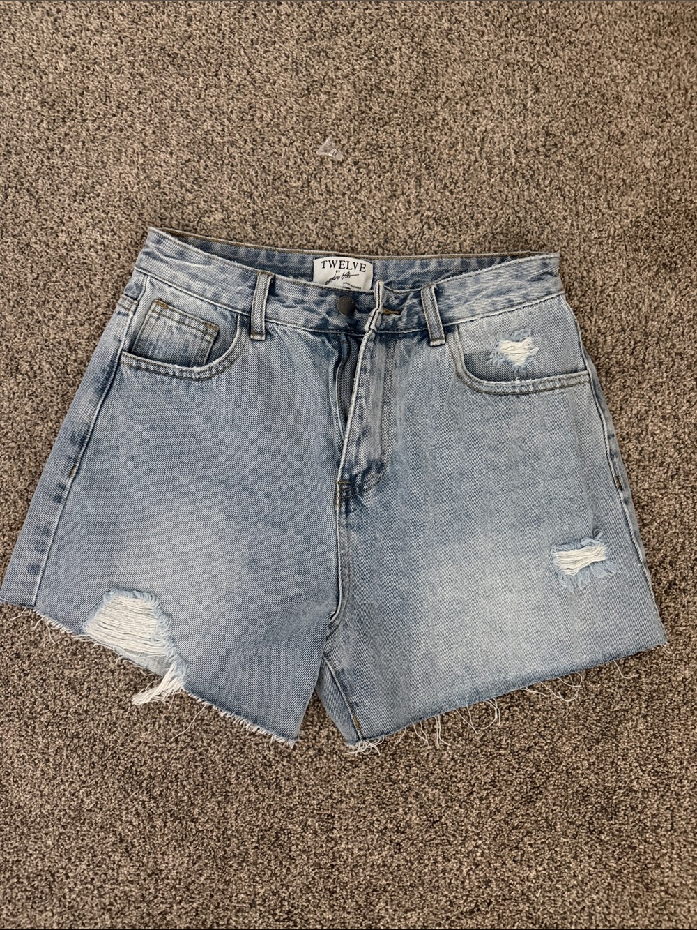 Twelve by Twelve Light Wash Distressed Denim Shorts